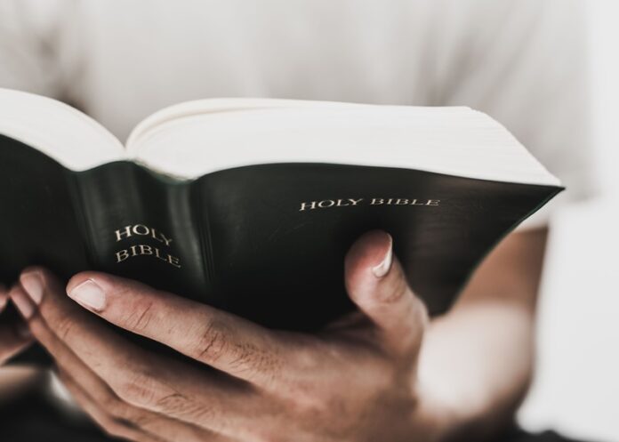 Man reading a bible