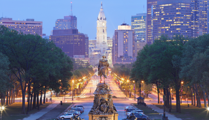 Pennsylvania street with statue and traffic