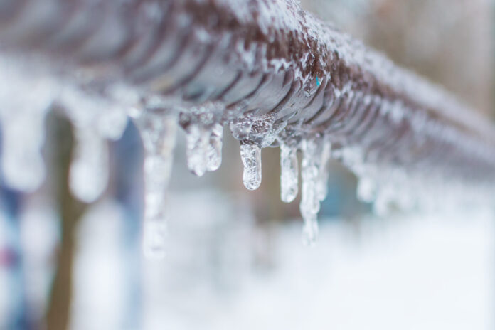 frozen pipes with icicles